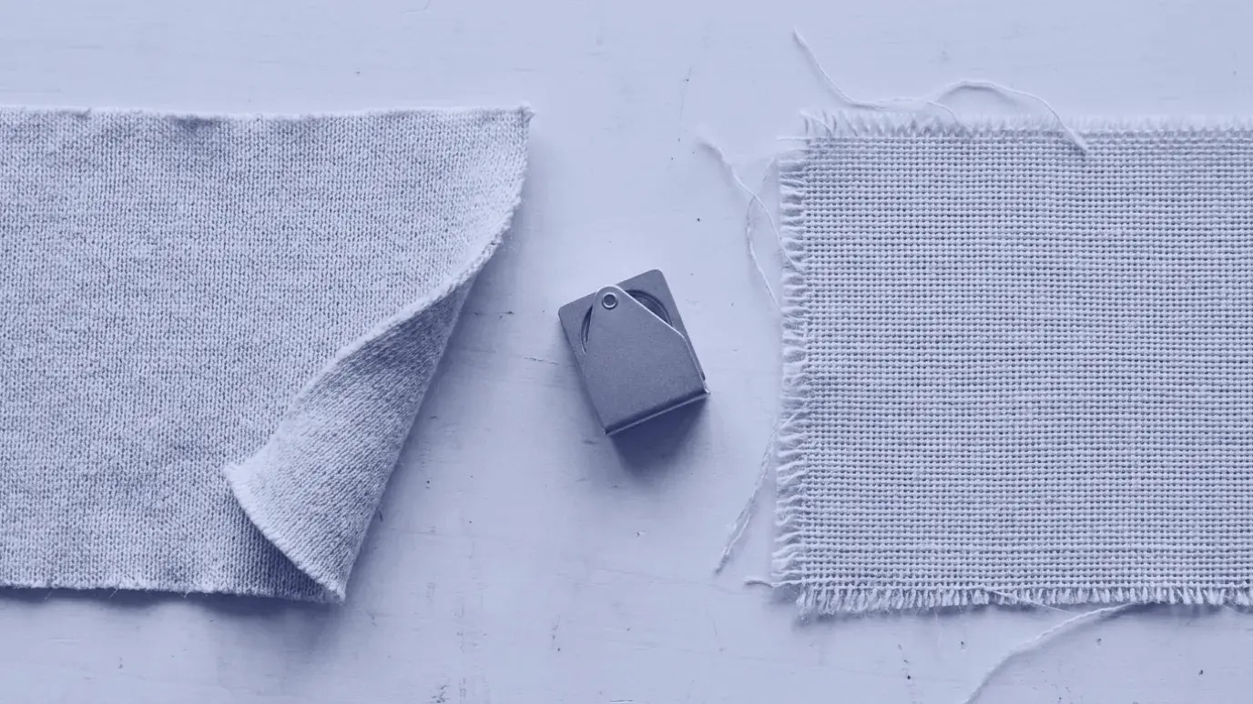 Two swatches side by side: knit with a curling edge on the left, woven with a fraying edge on the right